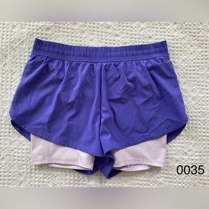 DSG Purple Athletic shorts w/ spandex shorts & side pocket women’s size M (0035)